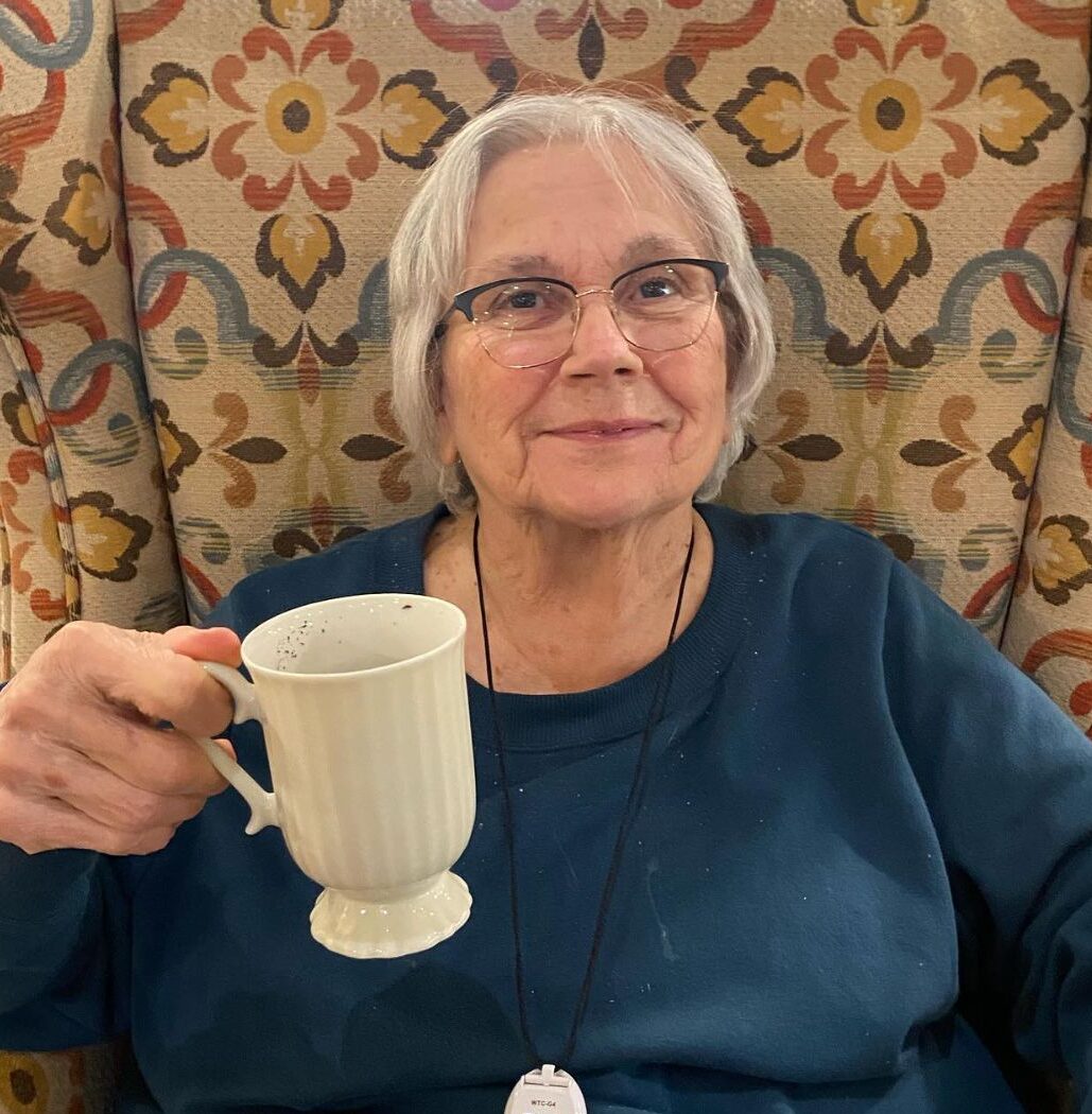 Resident enjoying a hot cuppa tea or coffee at Carriage Court Senior Living in Hilliard, OH