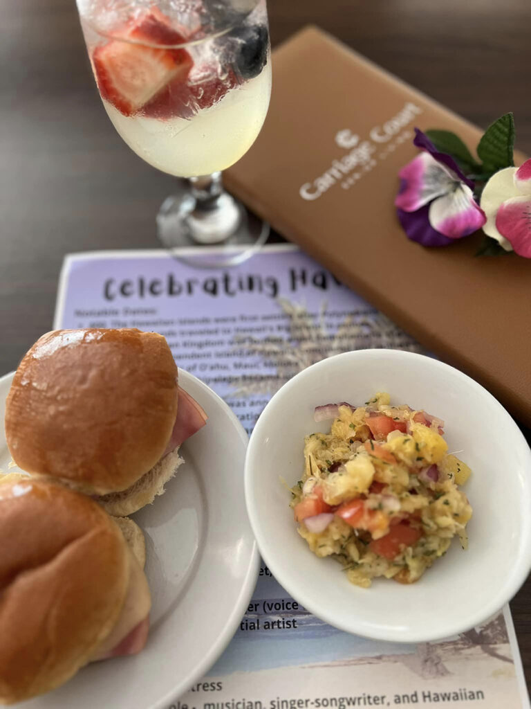 Indulge in Chef Jay's Hawaiian Happy Hour: Ham, cheese, and special sauce sliders served with her homemade pineapple salsa. A culinary delight awaits!